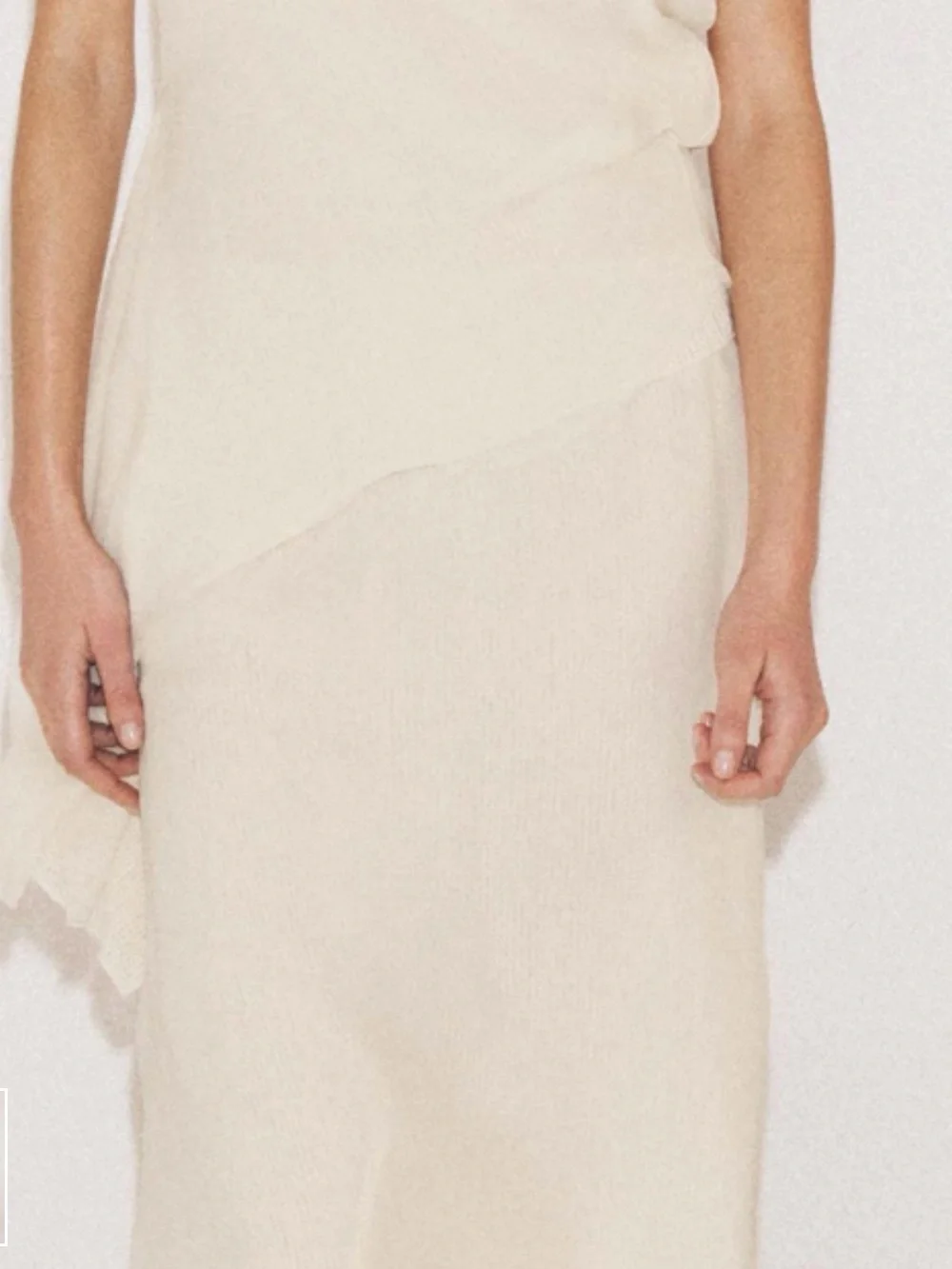 Mid-rise midi skirt with elastic waistband. Double effect detail NWT